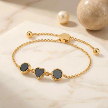 Enchanting Heart Black Onyx Gold Bracelet