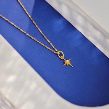 Radiant Gold Star Charm Pendant