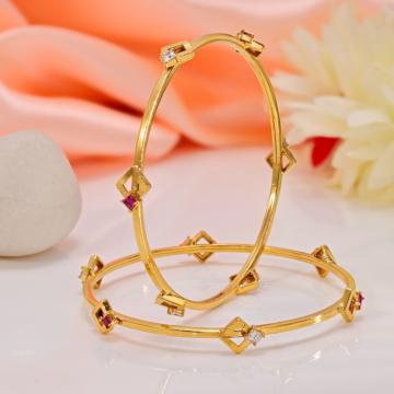 Stylish Pink-Stoned Textured Gold Bangles