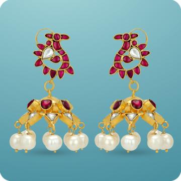 Scintillating Pink Stoned Peacock Silver Earrings