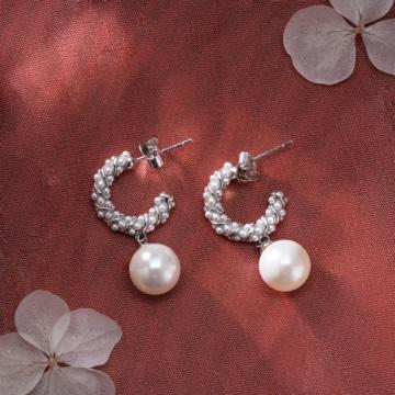 Stellar Dangling Pearl Silver Earrings