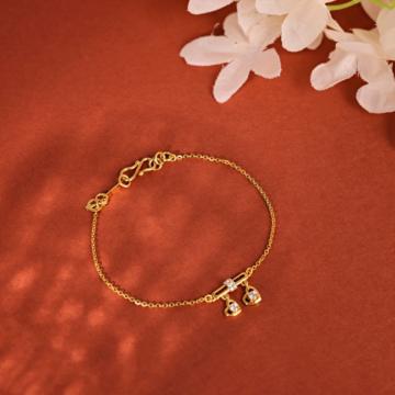 Enchanting Gold Twin Heart Charm Bracelet