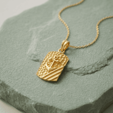Voyage-Inspired Gold Anchor Pendant