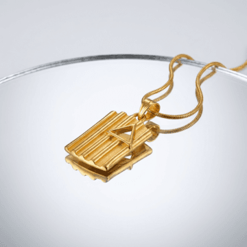 Refined Gold Architectural Pendant